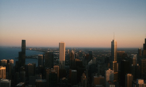 Chicago skyline at dusk from luxury apartment balcony - chicago luxury living